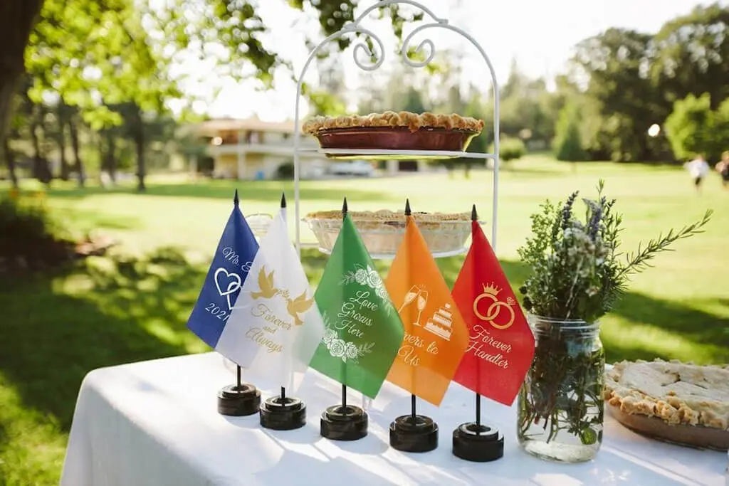 custom garden flags standing in the front yard