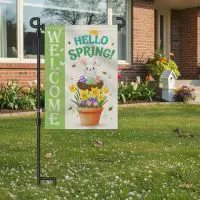 Garden flag stand displaying a spring garden flag in an outdoor yard