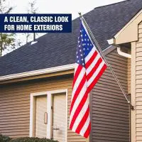Sectional Wall Mount Flag Pole with Rotating Rings | Stainless Steel 15 Sectional flag pole mounted on a home exterior displaying a flag at an angle
