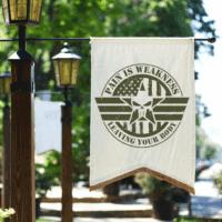 Custom guidon flags displayed on outdoor pole in sunlight with military-style design.
