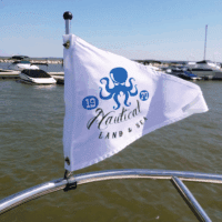 Custom pennant flags featuring an octopus design, perfect for nautical or marine-themed events.