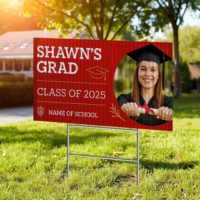 Custom graduation yard sign featuring graduate's photo and name displayed on lawn