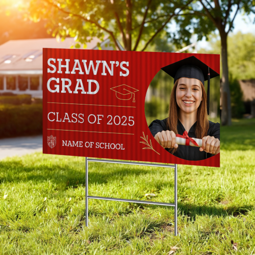 Custom graduation yard sign featuring graduate's photo and name displayed on lawn